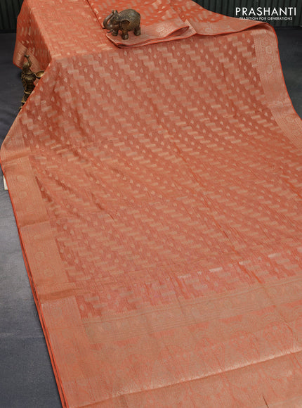 Crushed tissue saree orange with allover zari woven buttas and zari woven floral border