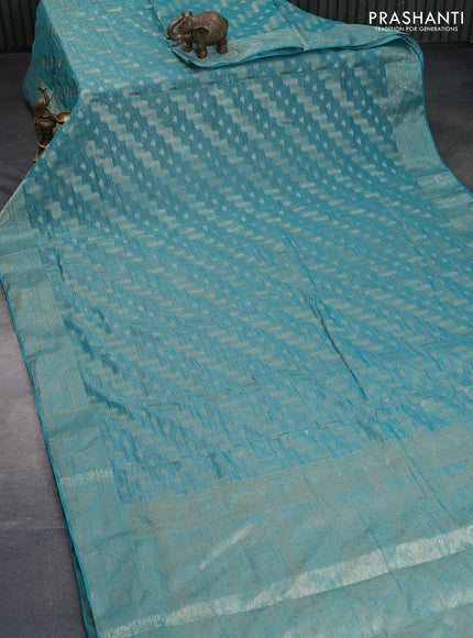 Crushed tissue saree teal blue with allover zari woven buttas and zari woven floral border