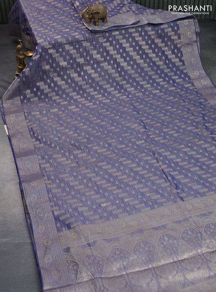 Crushed tissue saree dark blue with allover zari woven buttas and zari woven floral border