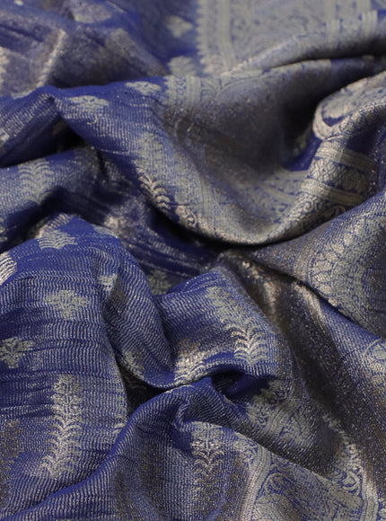 Crushed tissue saree dark blue with allover zari woven buttas and zari woven floral border