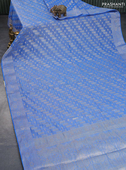 Crushed tissue saree blue with allover zari woven buttas and zari woven floral border