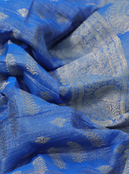 Crushed tissue saree blue with allover zari woven buttas and zari woven floral border