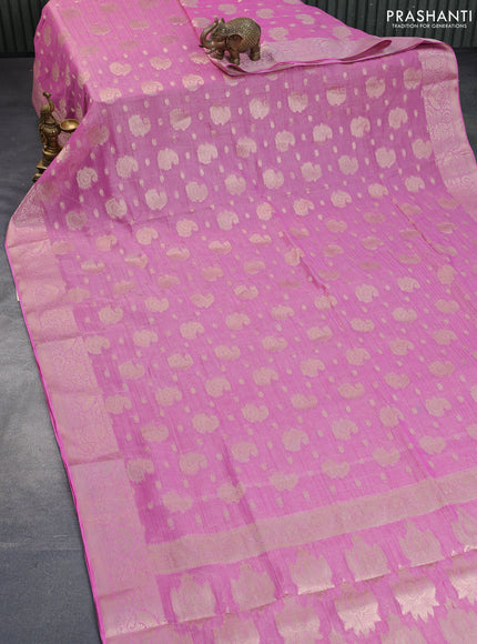 Crushed tissue saree light pink with allover zari woven buttas and zari woven border