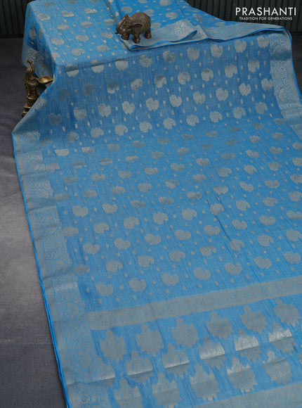 Crushed tissue saree cs blue with allover zari woven buttas and zari woven border