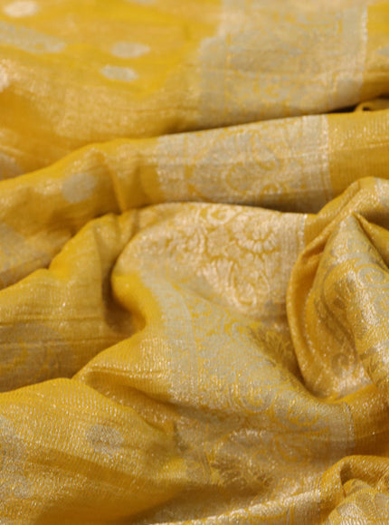 Crushed tissue saree yellow with allover zari woven buttas and zari woven border