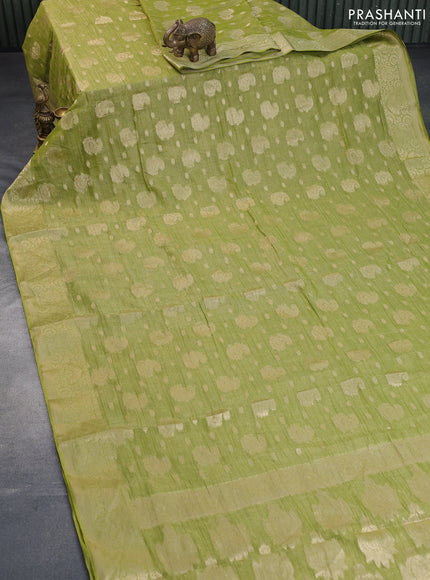 Crushed tissue saree light green with allover zari woven buttas and zari woven border