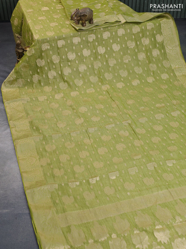 Crushed tissue saree light green with allover zari woven buttas and zari woven border