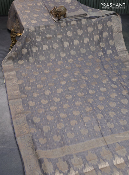 Crushed tissue saree grey with allover zari woven buttas and zari woven border