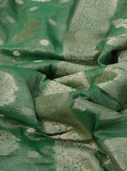 Crushed tissue saree green with allover zari woven buttas and zari woven border