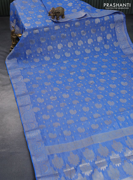 Crushed tissue saree blue with allover zari woven buttas and zari woven border