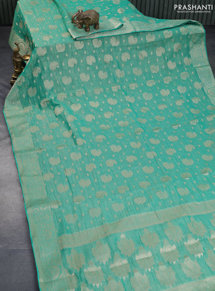 Crushed tissue saree teal green with allover zari woven buttas and zari woven border