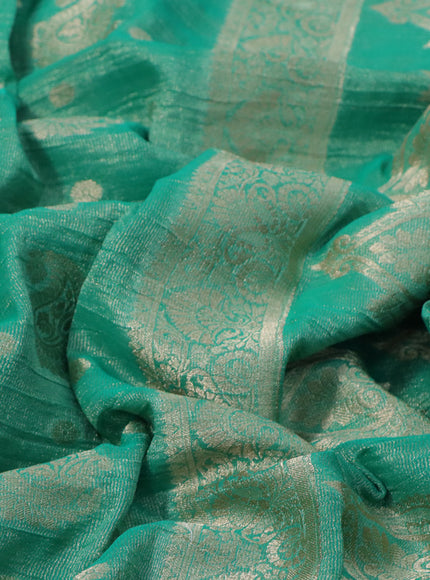 Crushed tissue saree teal green with allover zari woven buttas and zari woven border