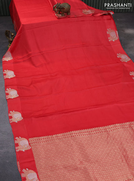 Mushru silk saree red with allover self emboss and elephant zari woven butta border