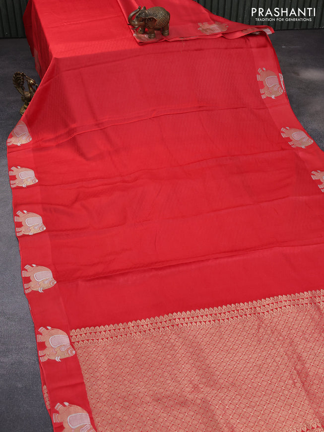 Mushru silk saree red with allover self emboss and elephant zari woven butta border