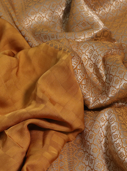 Mushru silk saree with allover self emboss and zari woven butta border