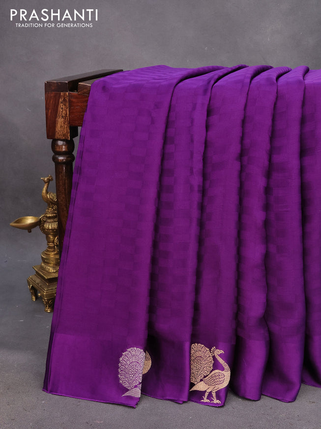 Mushru silk saree violet with allover self emboss and zari woven butta border