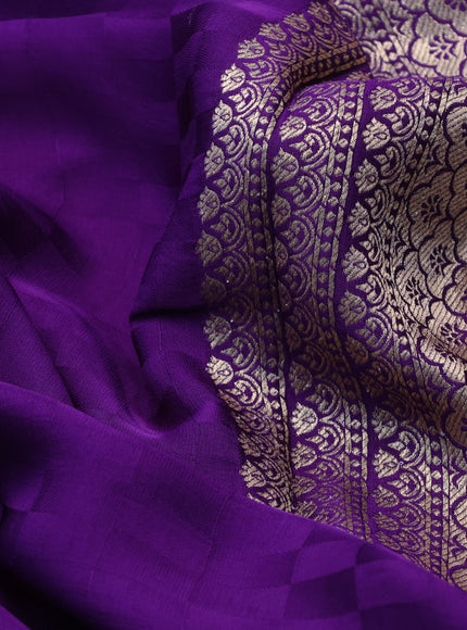 Mushru silk saree violet with allover self emboss and zari woven butta border