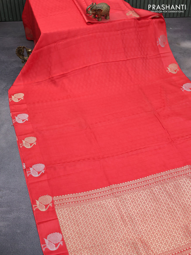 Mushru silk saree red with allover self emboss and zari woven butta border