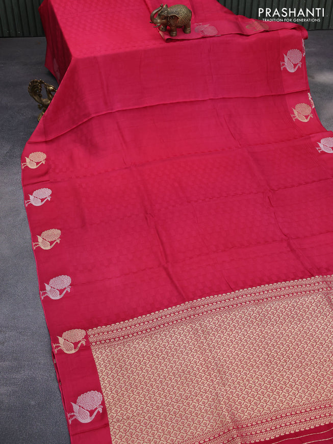 Mushru silk saree pink with allover self emboss and zari woven butta border