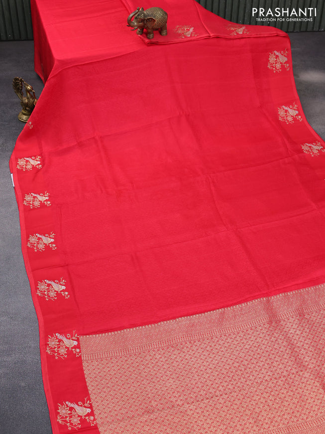 Mushru silk saree red with allover self emboss and zari woven butta border