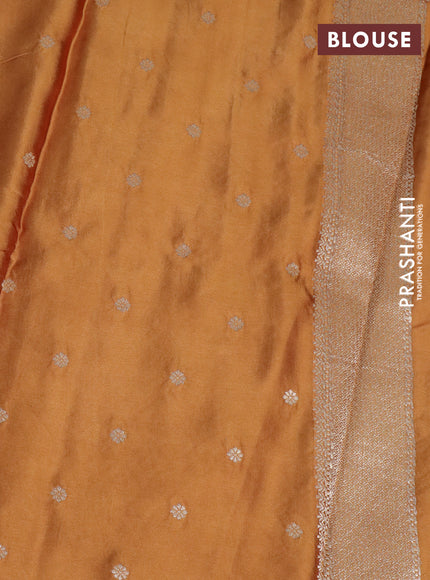 Mushru silk saree mustard shade with allover self emboss and zari woven butta border