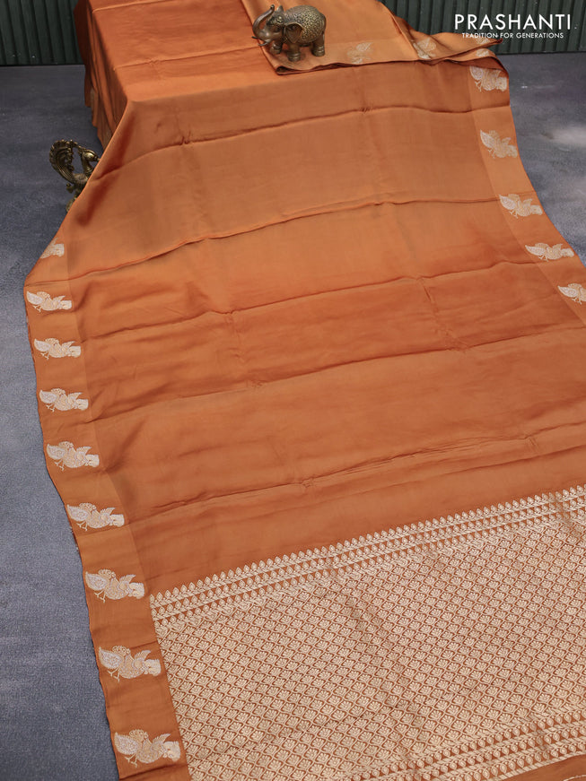 Mushru silk saree mustard shade with plain body and zari woven butta border