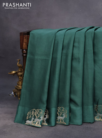 Mushru silk saree green with allover self emboss and zari woven butta border