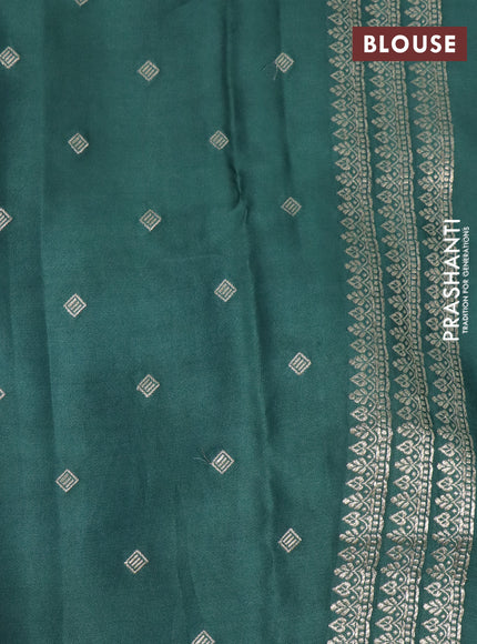 Mushru silk saree green with allover self emboss and zari woven butta border