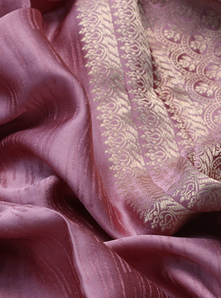 Mushru silk saree pastel pink with allover self emboss and zari woven butta border