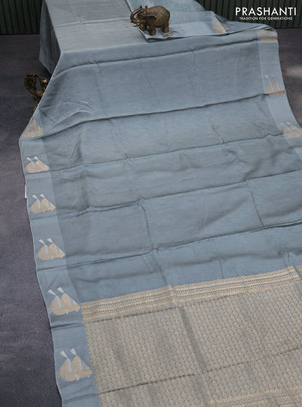 Mushru silk saree grey with allover self emboss and zari woven butta border