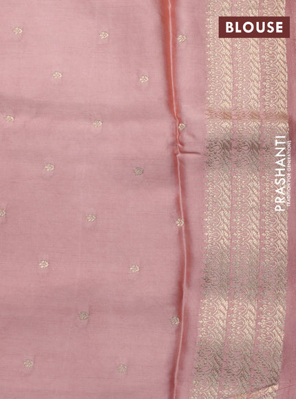 Mushru silk saree pastel peach with allover self emboss and zari woven butta border