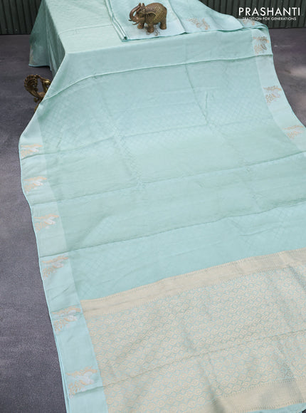 Mushru silk saree pastel blue with allover self emboss and zari woven butta border