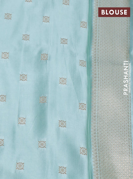 Mushru silk saree pastel blue with allover self emboss and zari woven butta border