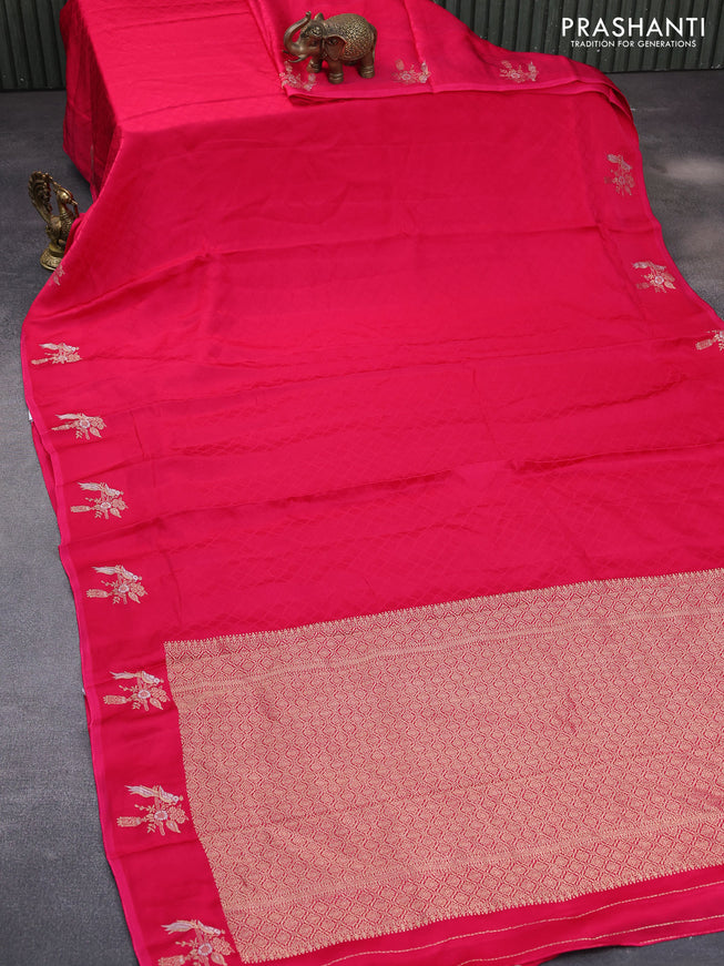 Mushru silk saree pink with allover self emboss and zari woven butta border