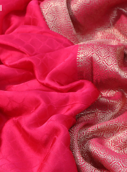 Mushru silk saree pink with allover self emboss and zari woven butta border