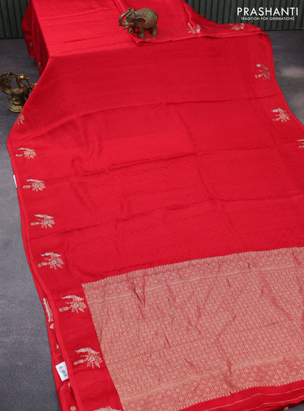 Mushru silk saree red with allover self emboss and zari woven butta border