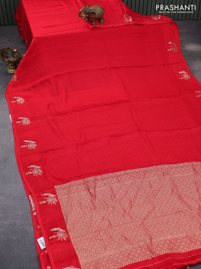 Mushru silk saree red with allover self emboss and zari woven butta border