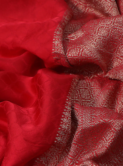 Mushru silk saree red with allover self emboss and zari woven butta border