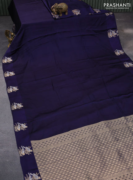 Mushru silk saree dark blue with allover self emboss and zari woven butta border