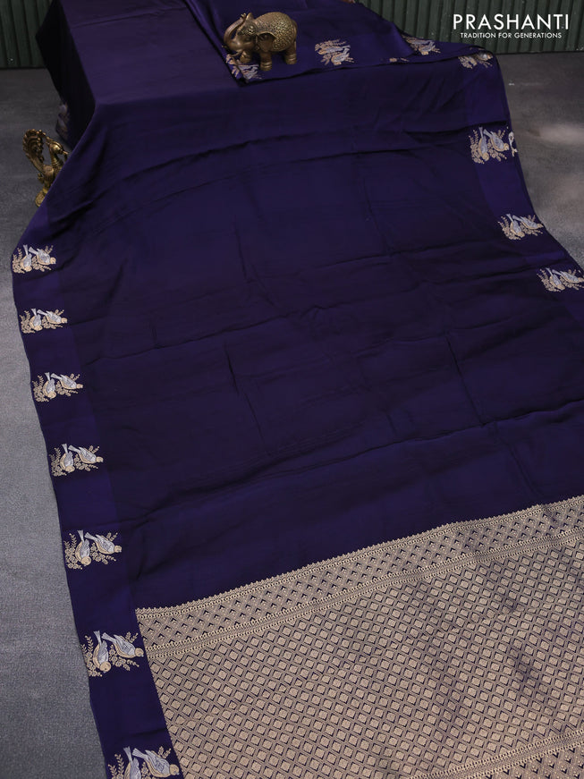 Mushru silk saree dark blue with allover self emboss and zari woven butta border