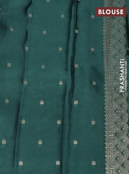 Mushru silk saree green with allover self emboss and zari woven butta border