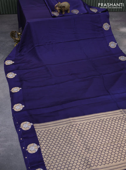 Mushru silk saree dark blue with allover self emboss and zari woven butta border