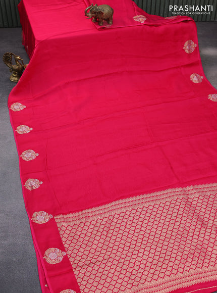 Mushru silk saree pink with allover self emboss and zari woven butta border