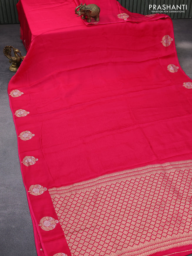 Mushru silk saree pink with allover self emboss and zari woven butta border