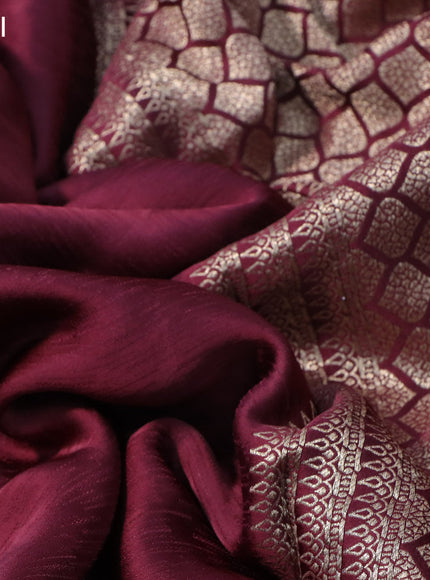 Mushru silk saree maroon with allover self emboss and zari woven butta border