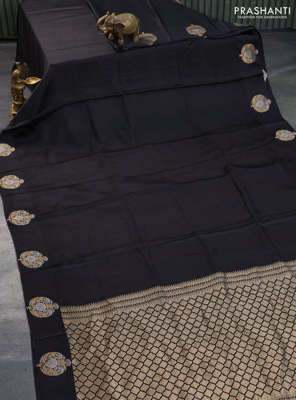 Mushru silk saree black with allover self emboss and zari woven butta border