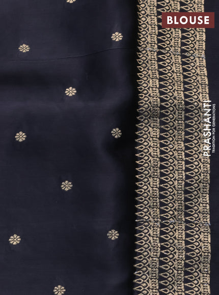 Mushru silk saree black with allover self emboss and zari woven butta border