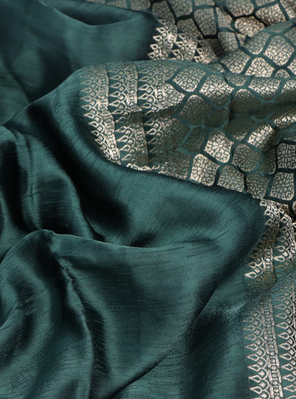 Mushru silk saree green with allover self emboss and zari woven butta border