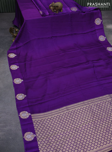 Mushru silk saree violet with allover self emboss and zari woven butta border