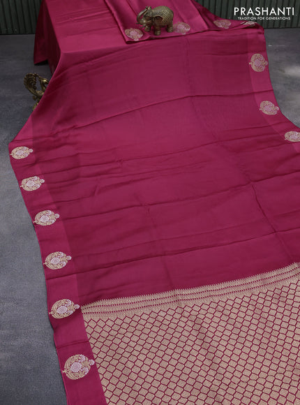 Mushru silk saree pink with allover self emboss and zari woven butta border